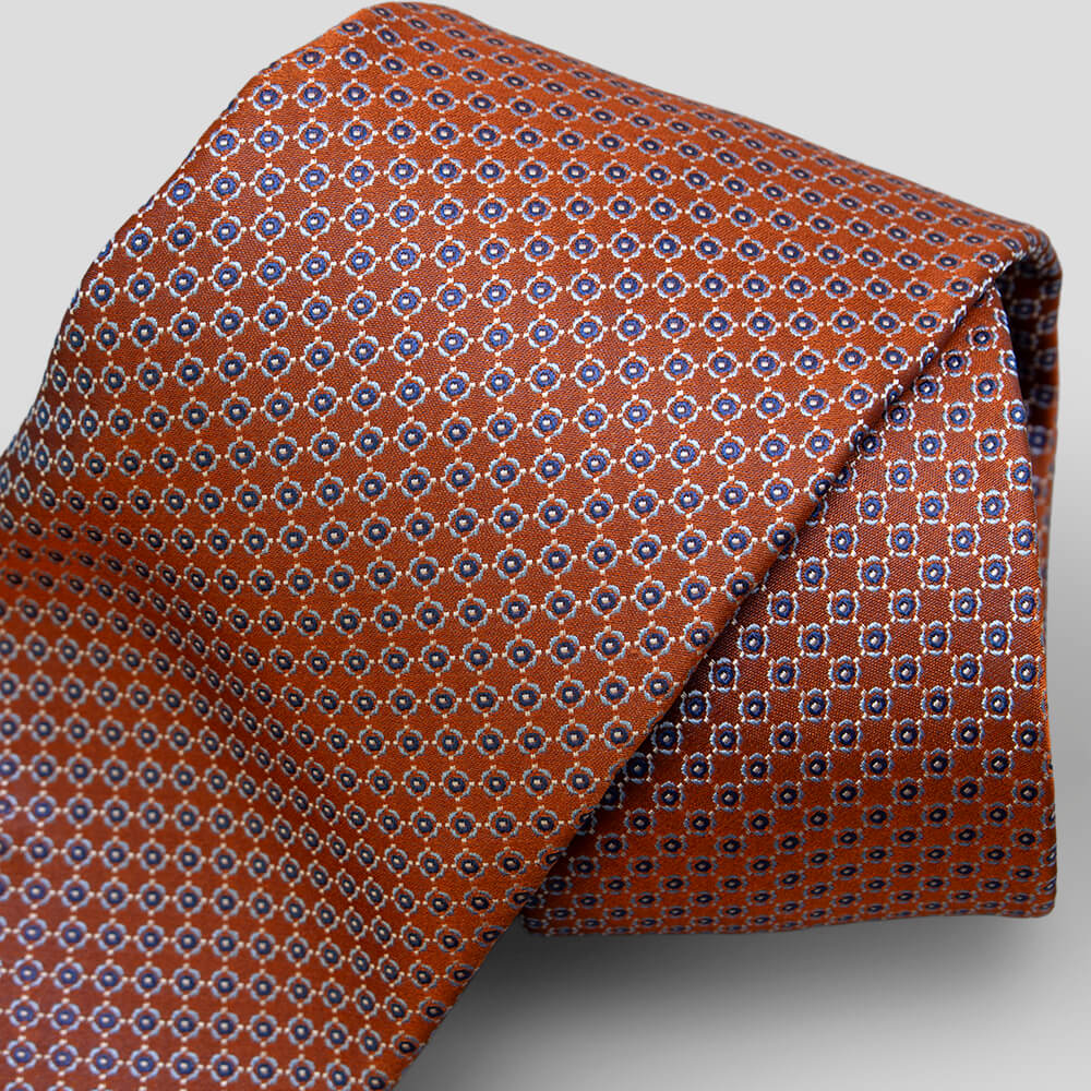 ステファノリッチのシルクジャカードネクタイ、オレンジ地にブルーとホワイトの小紋柄｜Stefano Ricci silk jacquard necktie in orange with blue and white small geometric motifs